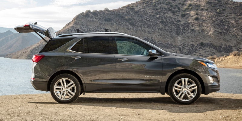 2020 Chevrolet Equinox parked by lake with trunk open