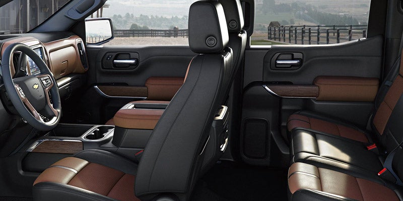 Interior view of the front and back seats in a 2020 Chevrolet Silverado 1500 showing spaciousness