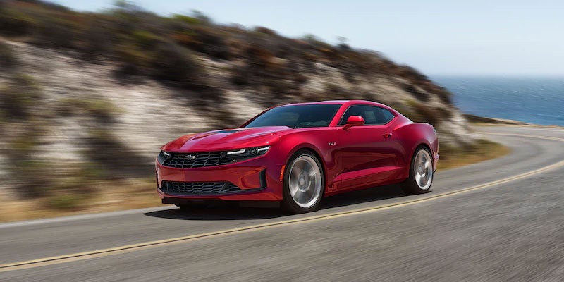 Red 2021 Chevrolet Camaro driving