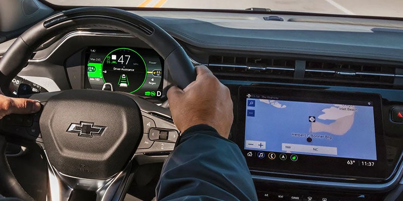 View of steering wheel, dashboard, and navigation system in a 2022 Chevrolet Bolt EUV