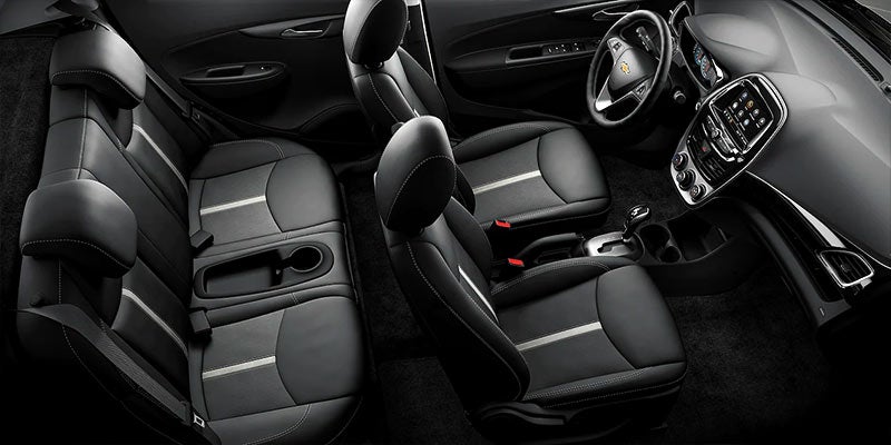 The interior seats of a 2022 Chevy Spark