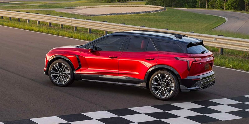 rear angeled view of 2024 Chevrolet Blazer EV parked on race track