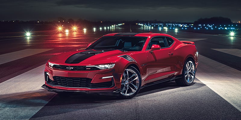 2024 Chevrolet Camaro red with a black strip down the middle