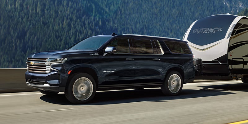 2024 Chevrolet Suburban pulling a camper