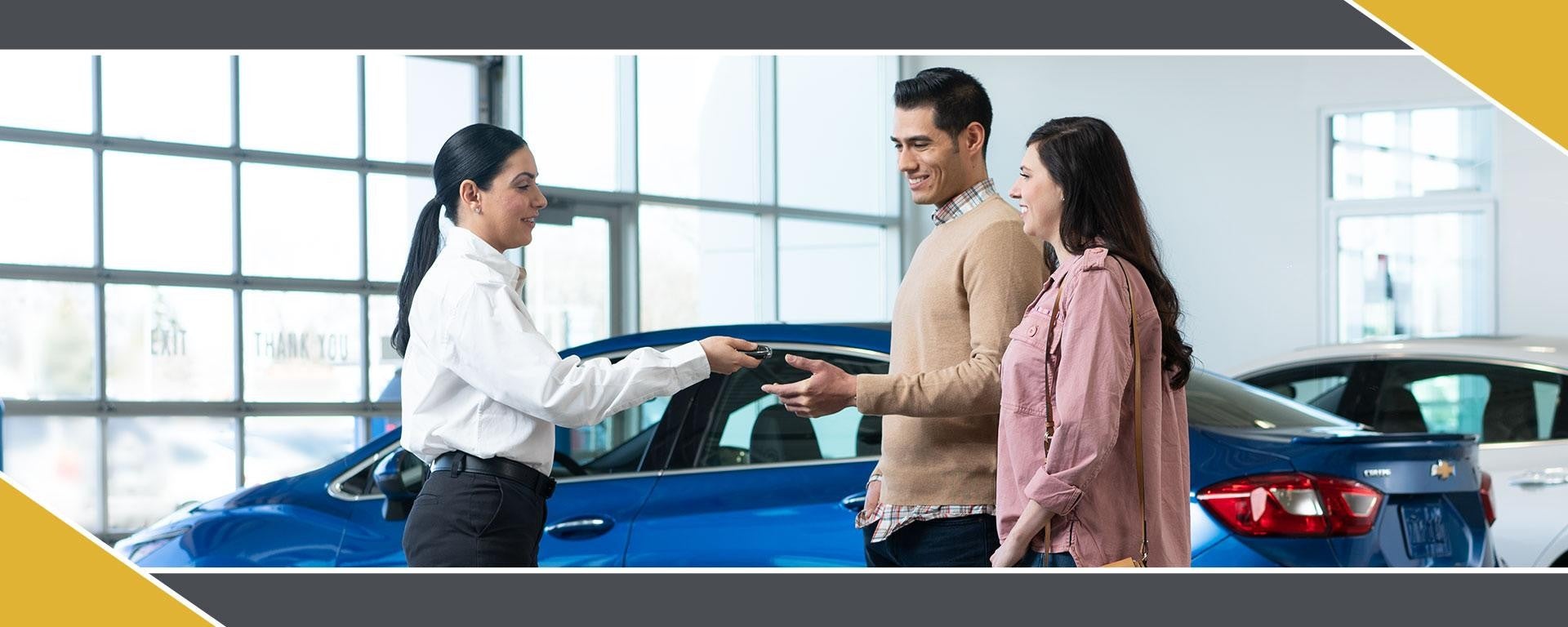 Representative handing customers keys
