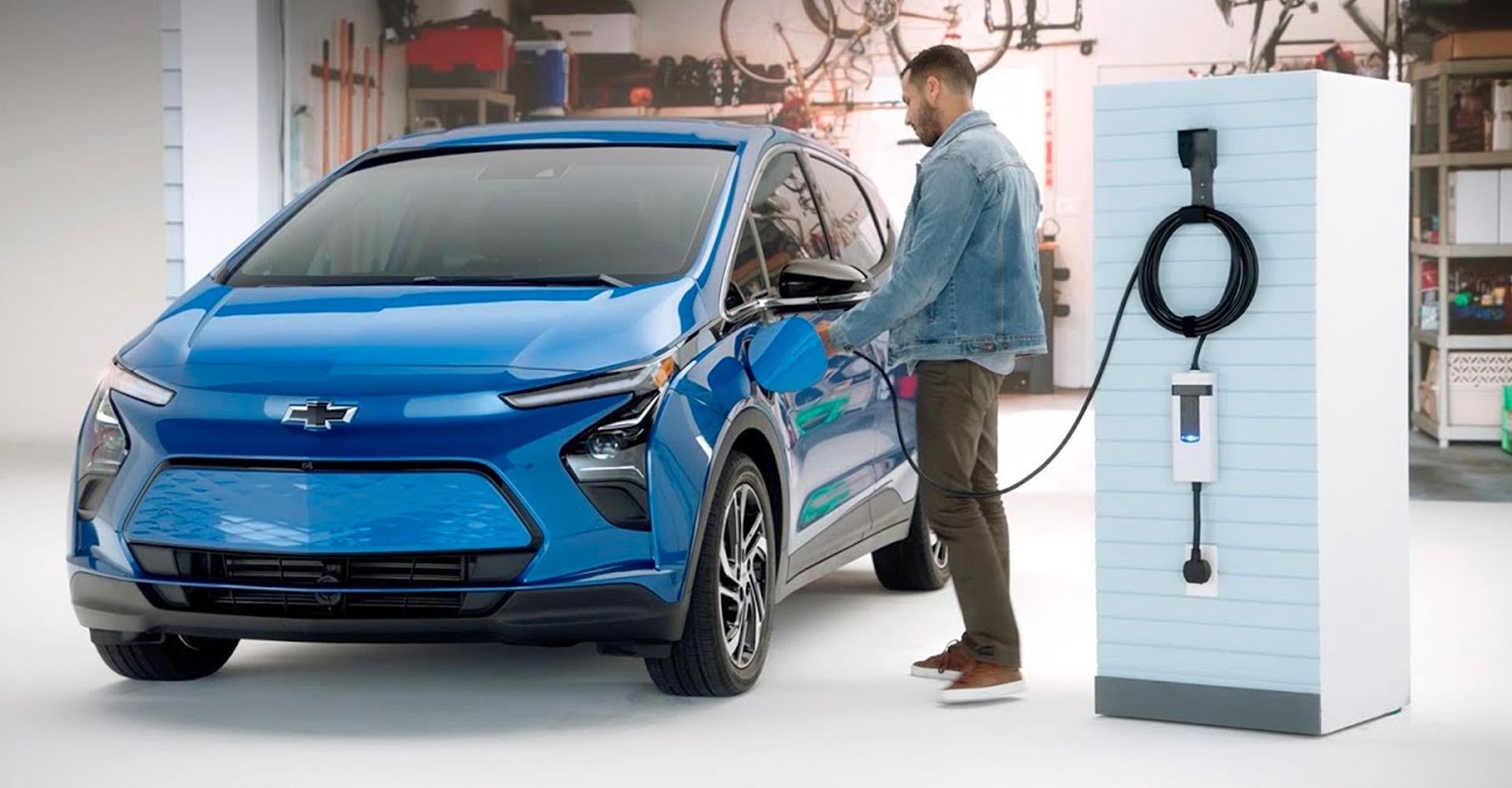 Chevy Blazer in Blue driving down road