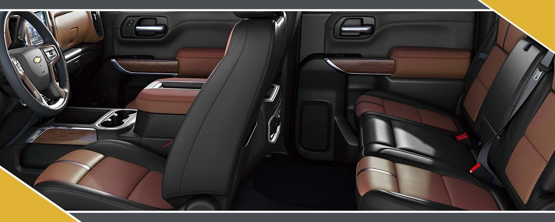 Friends pictured with a 2023 Chevy Tahoe