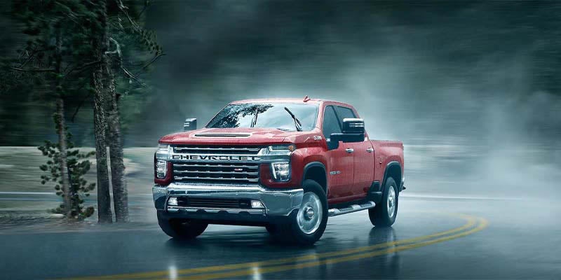 Red 2022 Chevrolet Silverado LTD in fog